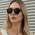 Damen modische runde Sonnenbrille mit transparentem Rahmen und UV-Schutz Brehn