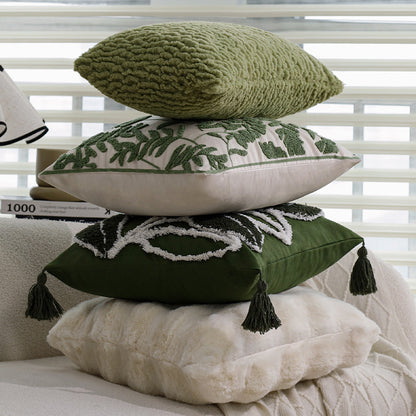 Quadratisches Zierkissen mit erhabenem Blatt‑Tufting und Quasten Brehn