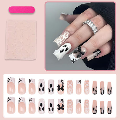 Kunstnagelset mit Halloween-Motiv und verspielten Verzierungen Brehn