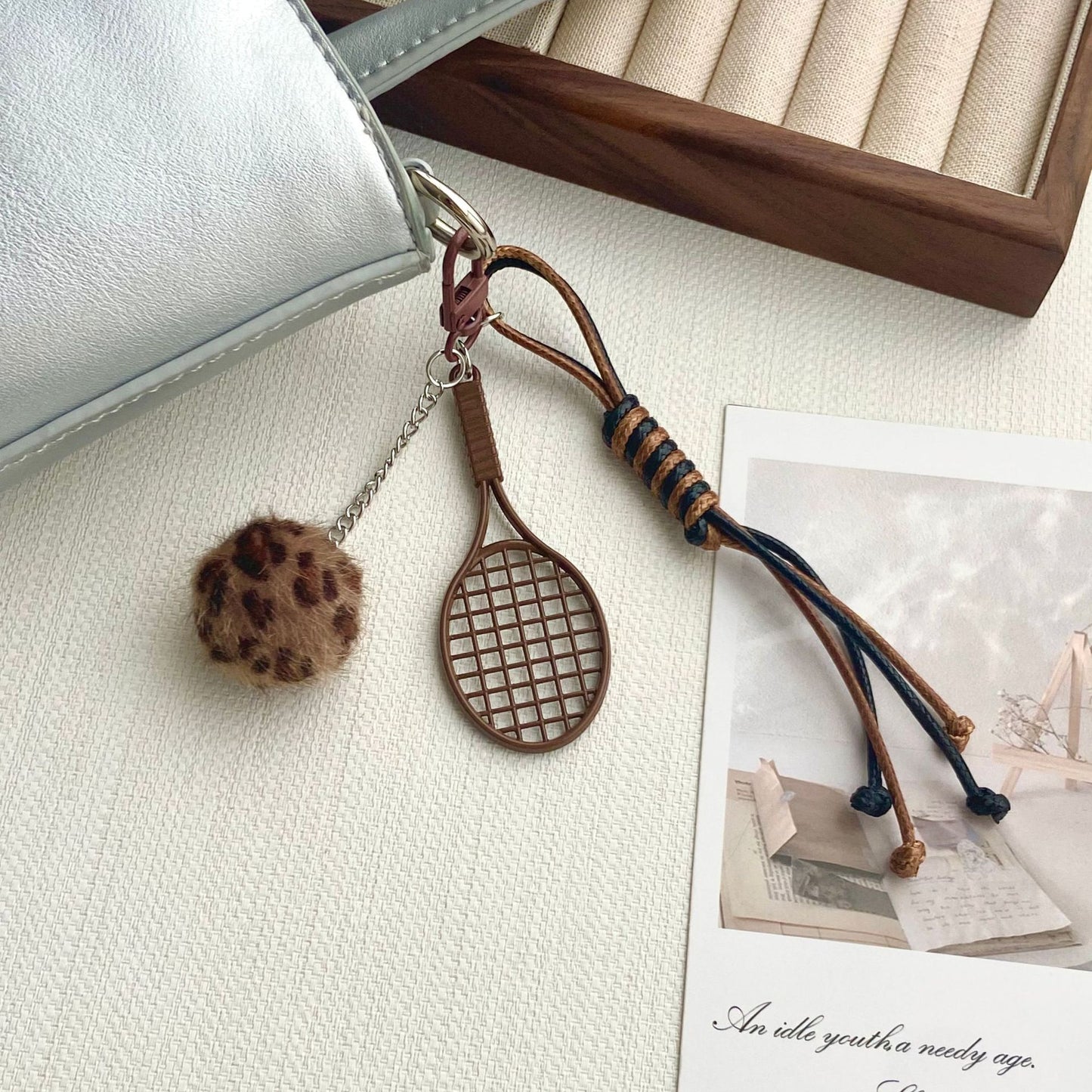 Tennisracket und Pelzball Schlüsselanhänger Brehn