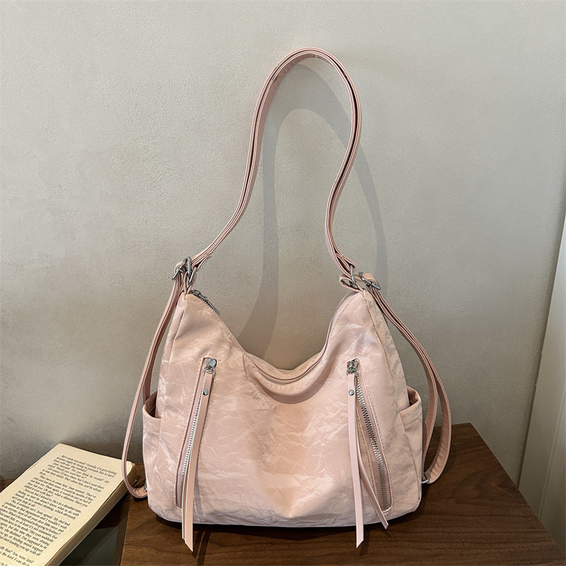 Vielseitige strukturierte Hobo-Tasche