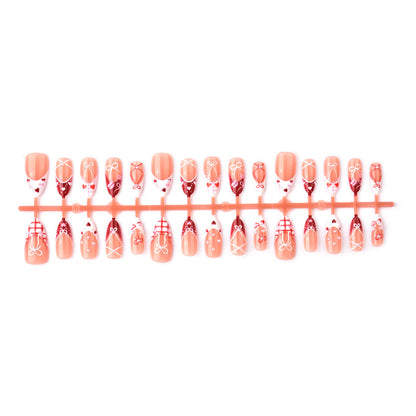 Dekoratives Presse-On Nagelkunstset mit Schleifen- und Herzen-Designs Brehn