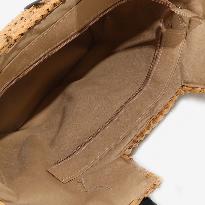 Damen Handtasche aus geflochtenem Naturmaterial mit eleganten Ledergriffen Brehn