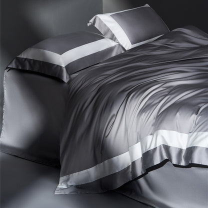Luxuriöses Satin Bettbezug Set mit kontrastiertem Rand und Kissenbezügen