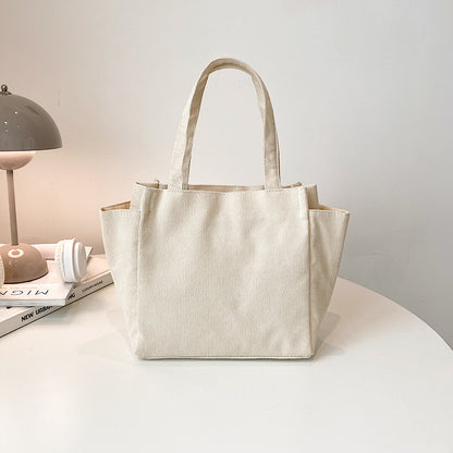 Texturierte Cordura-Tote-Tasche mit niedlichem Plüsch-Anhänger