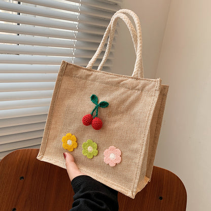 Dekorativer floraler Akzent Handtasche