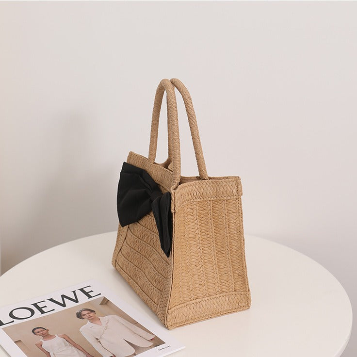 Elegante Basttasche mit Schleifendetail Brehn
