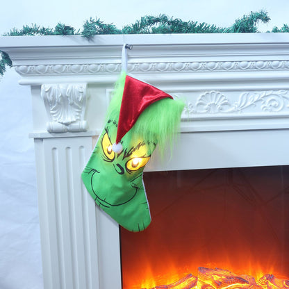 Lustiger Weihnachtsstrumpf im Grinch-Design