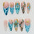 Kunstnagelset mit maritimen Motiven und glamourösen Verzierungen Brehn