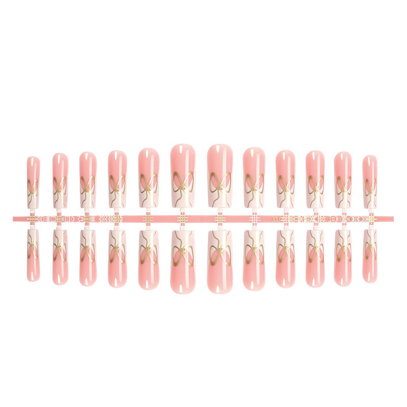 Dekorativer Press-On Nail Set mit künstlerischen Schleifen Designs Brehn