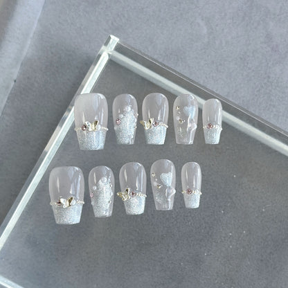 Dekorativer Press-On Nagelkunstset mit Edelstein- und Glitzerakzenten