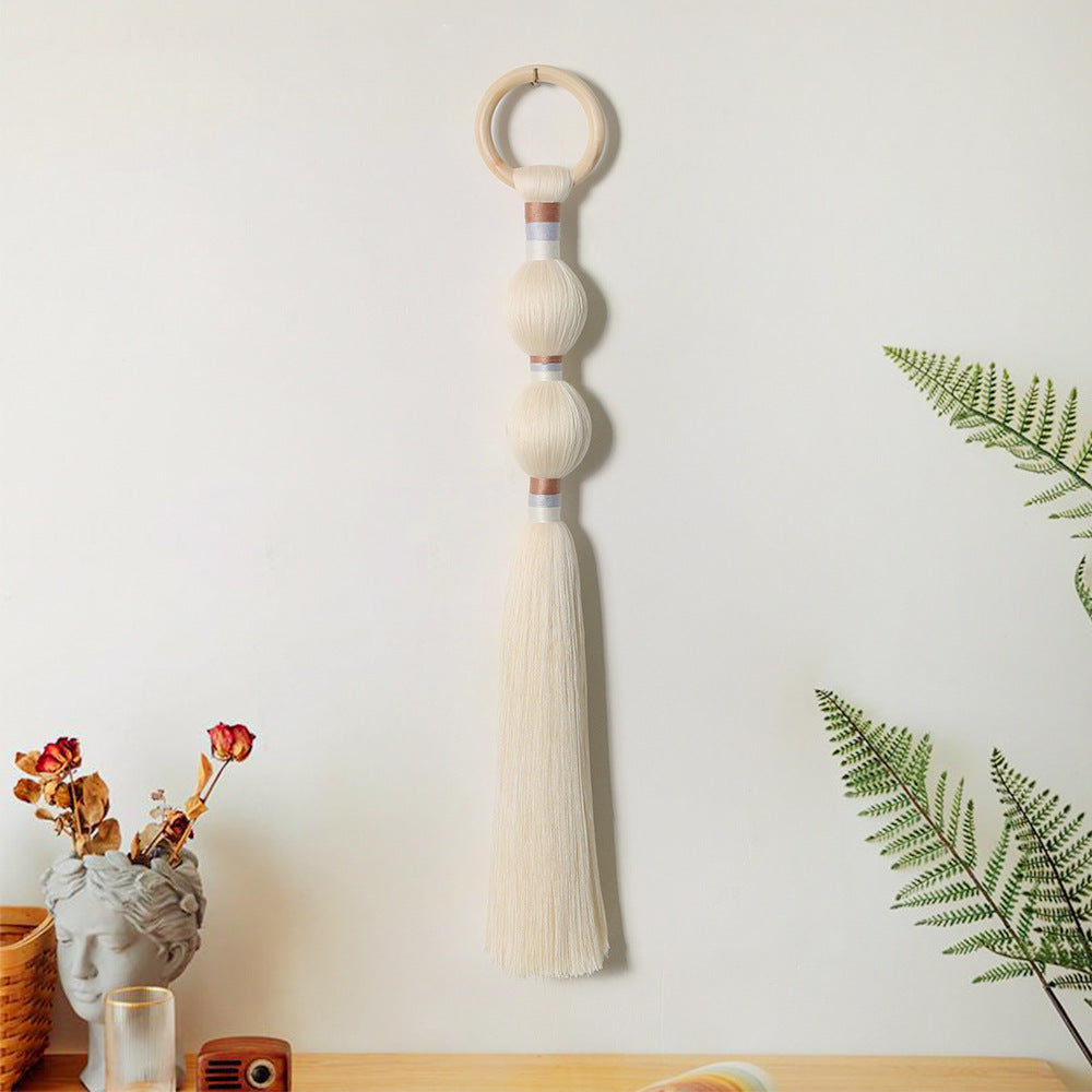 Wanddekoration mit elegantem Quastendesign
