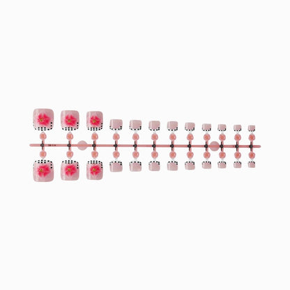 Kunstnagelset mit eleganten Blüten- und Punkte-Design Brehn