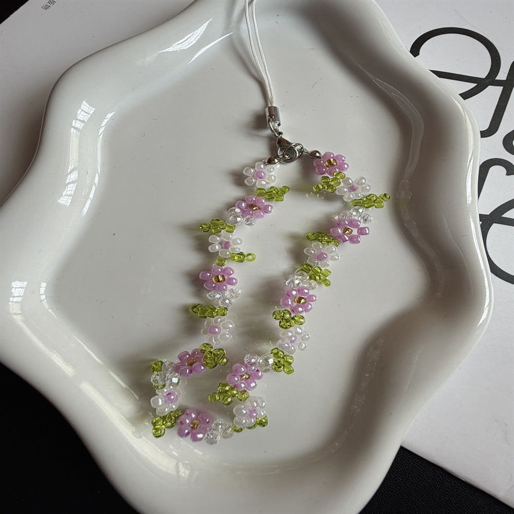 Perlenbesetzte Blumenschmuckkette Brehn