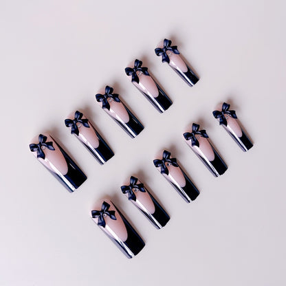 Elegante Kunstnagelspitzen mit Schleifenverzierungen Brehn