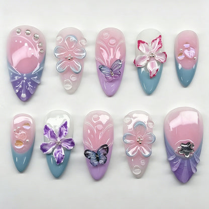 Kunstnagelset mit eleganten Blumen- und Schmetterlingsverzierungen Brehn