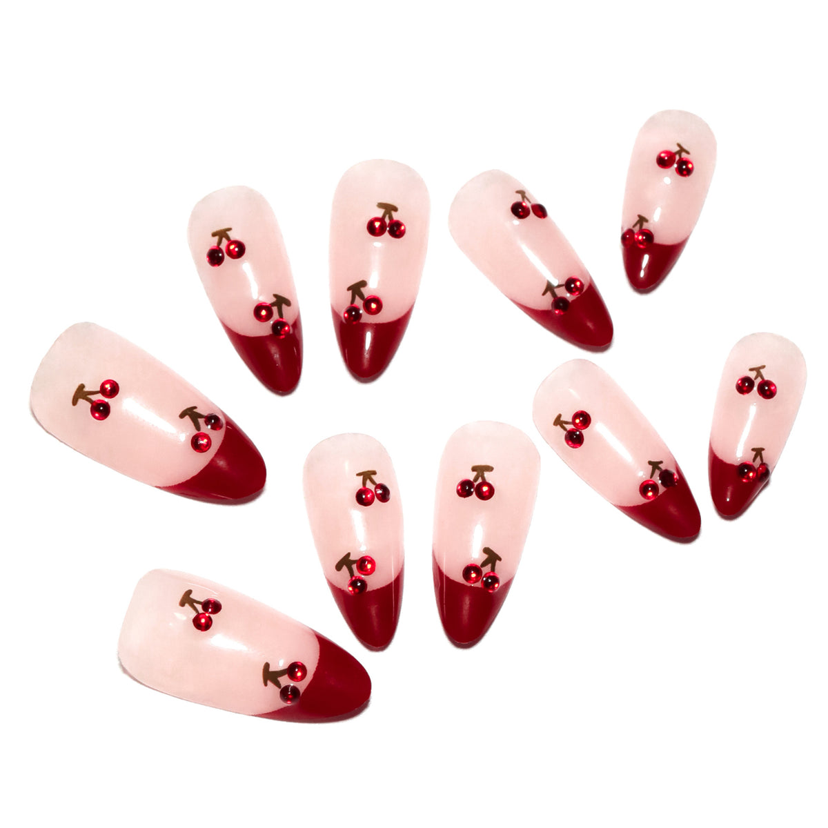 Kunstvolle Stiletto-Nägel mit Kirschmotiven und Glitzerakzenten Brehn