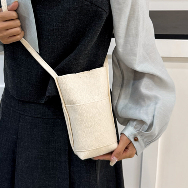 Minimalistische Texturierte Umhängetasche