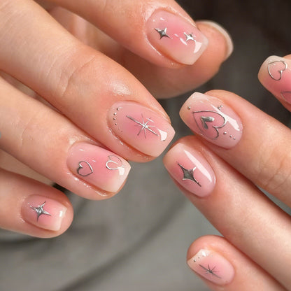 Kunstnagelset mit liebevollen Herz- und Sternenmotiven Brehn