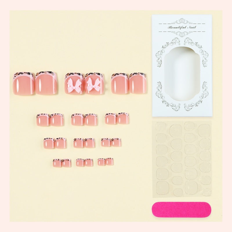 Kunstnagelset mit eleganten Schleifen-Design Brehn