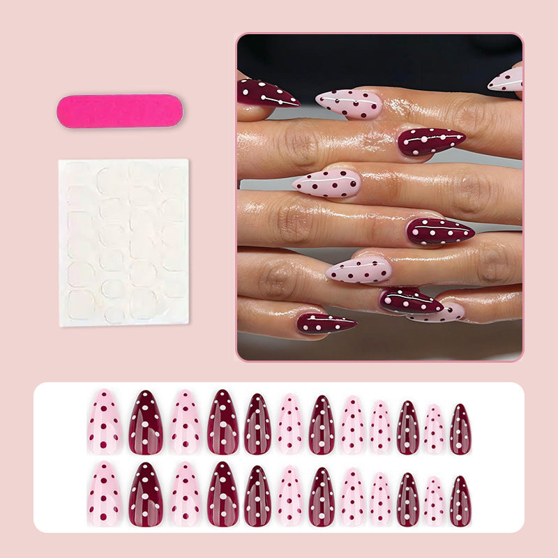 Kunstnagelset mit eleganten Punkten und trendigem Design Brehn