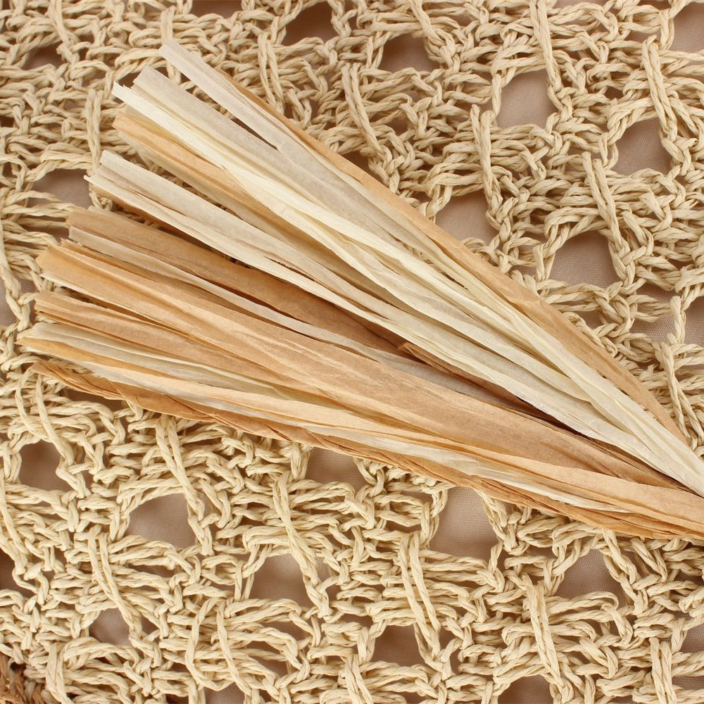 Handtasche Aus Handgewebtem Naturmaterial mit Ansprechendem Quastendetail Brehn