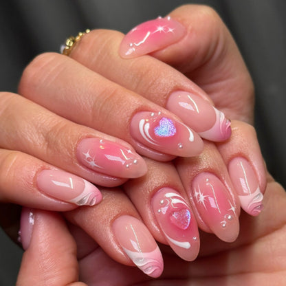 Kunstnagelset mit romantischem Herz-Design und Glitzerakzenten Brehn
