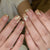 Kunstvolle Nagelgestaltung mit Blattmotiven Brehn