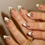 Kunstnagelset mit edlen Goldakzenten und transparentem Design Brehn