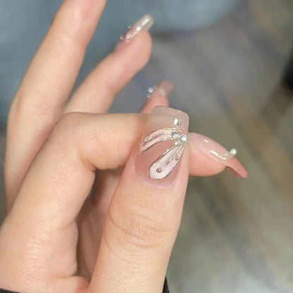Dekorativer Press-On-Nagelset mit Perlenakzenten Brehn