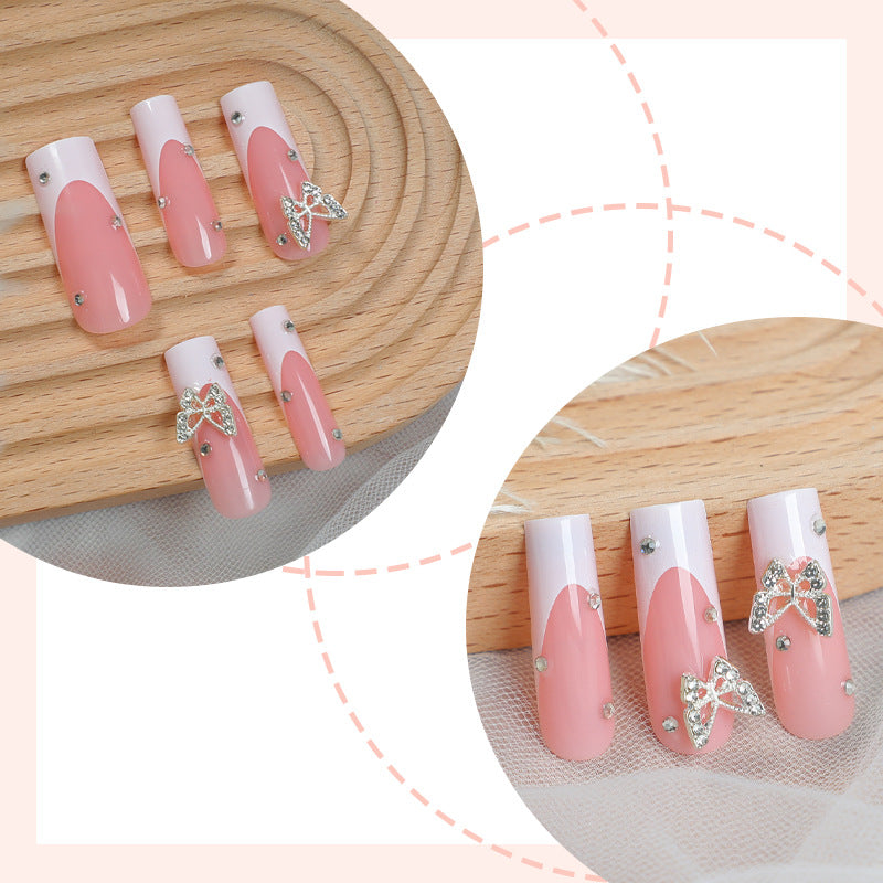 Dekorativer Press-On Nail Kit mit Schmetterlingsakzenten Brehn