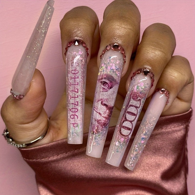 Glamouröses Kunstnagelset mit funkelnden Strass- und Kreuzverzierungen Brehn