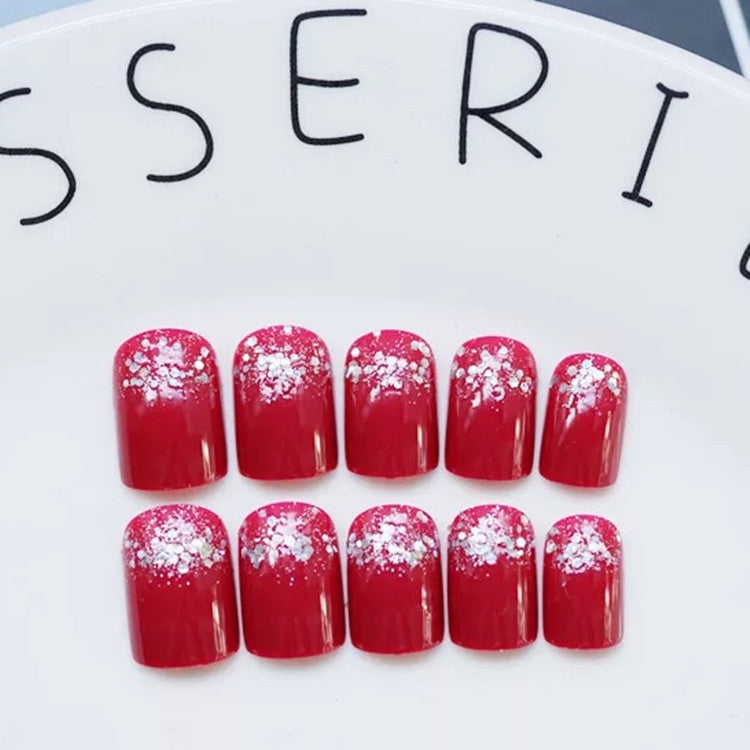 Glamouröse Kunstnägel mit Glitzerakzenten Brehn