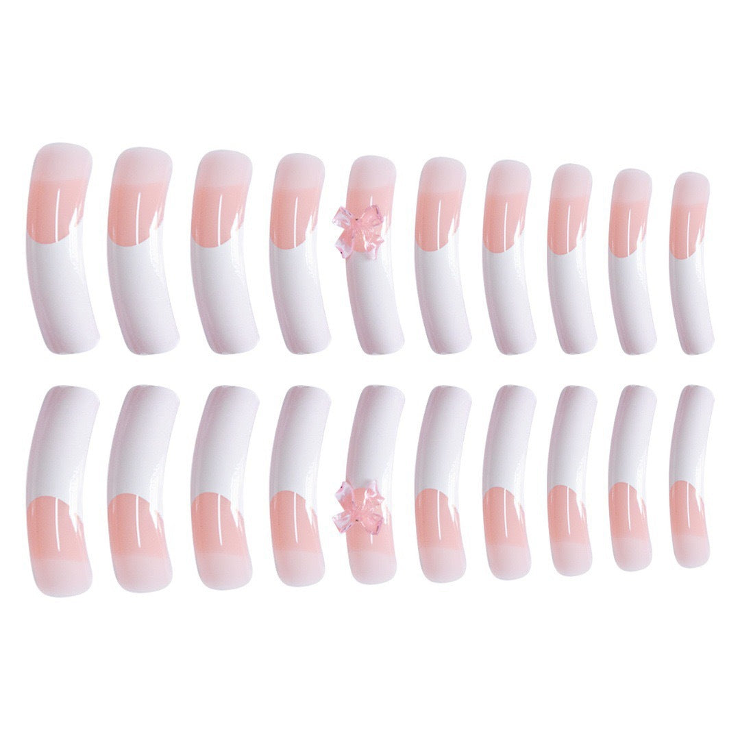 Elegante Nagelkunstverzierungen mit dekorativen Schleifenakzenten Brehn