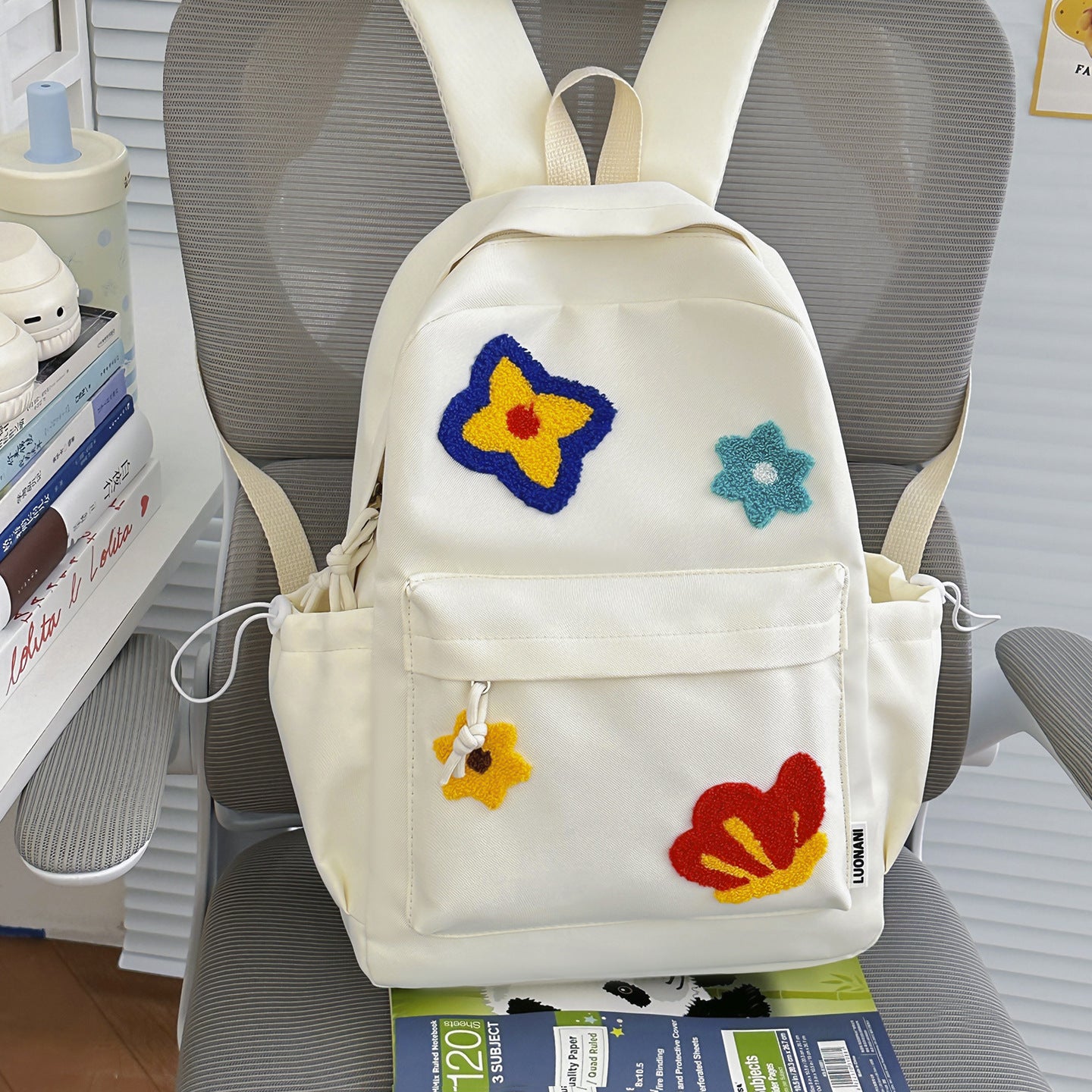 Blumenbestickter Schulrucksack
