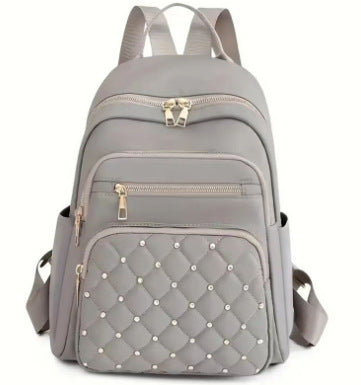 Damen gesteppter Rucksack mit dekorativen Nieten Brehn
