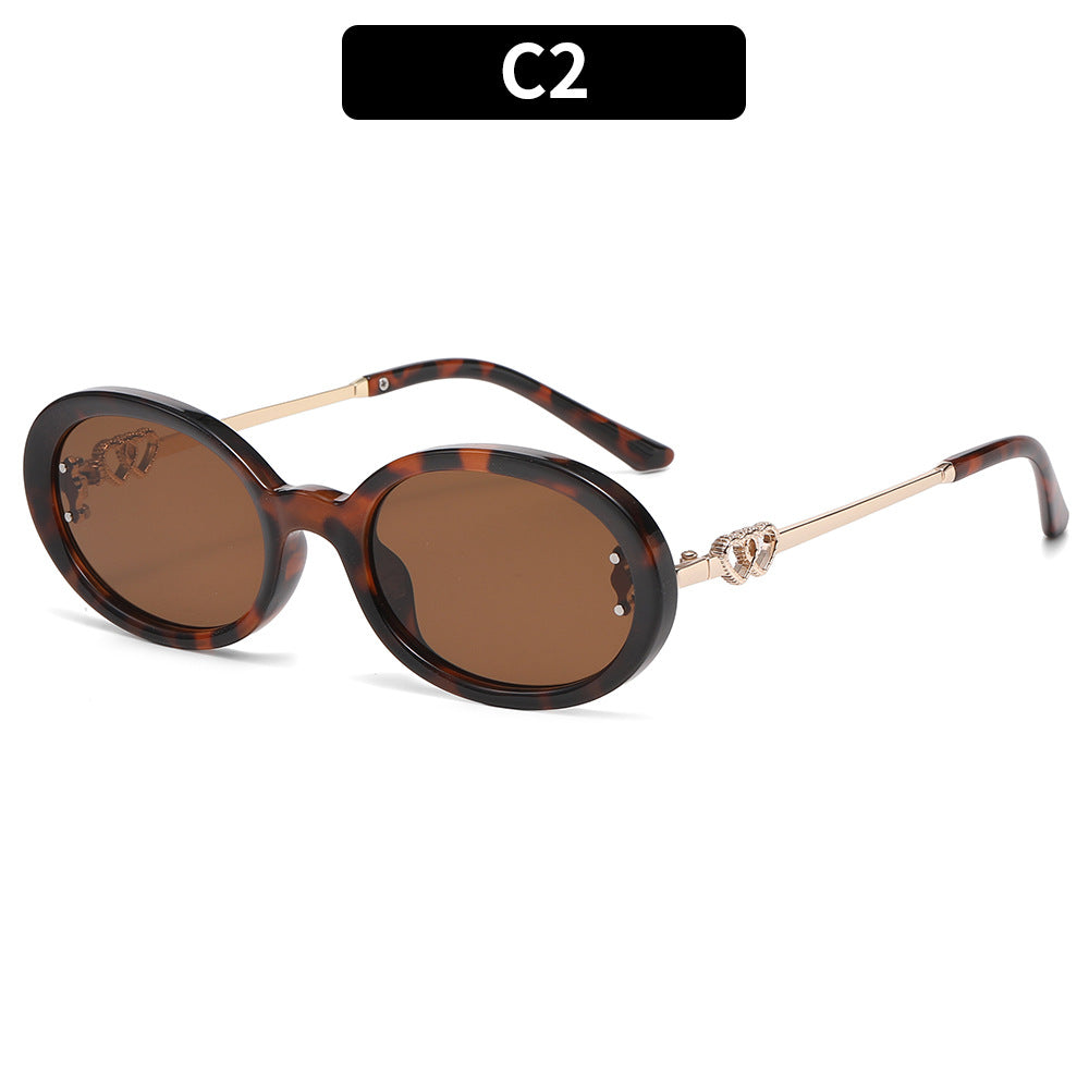 Premium ovale Rahmen-Sonnenbrille mit dekorativen Metallelementen