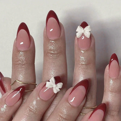Kunstnagelset mit elegantem Spitzen-Design und romantischen Schleifen Brehn