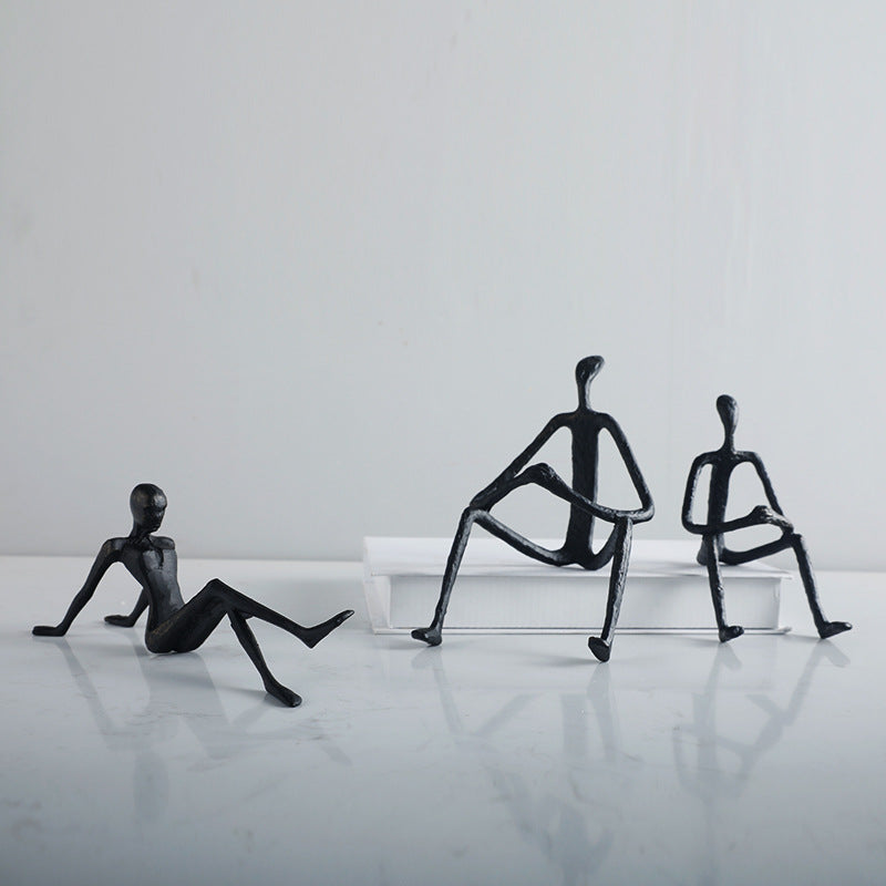 Künstlerische sitzende Figuren Skulptur