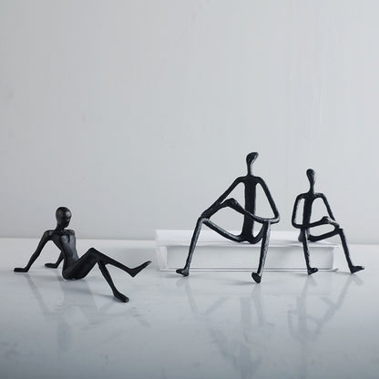 Künstlerische sitzende Figuren Skulptur