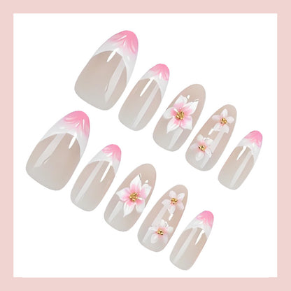 Kunstnagelset mit romantischen Blumen- und Ombre-Effekten Brehn