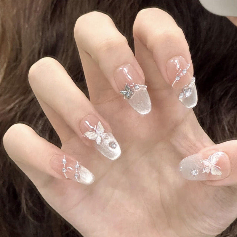 Kunstnagelset mit funkelnden Glitzer- und holografischen Akzenten Brehn