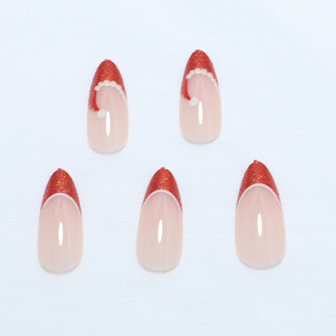 Künstlerische French Tip Press-On Nägel mit Glitzerakzenten Brehn