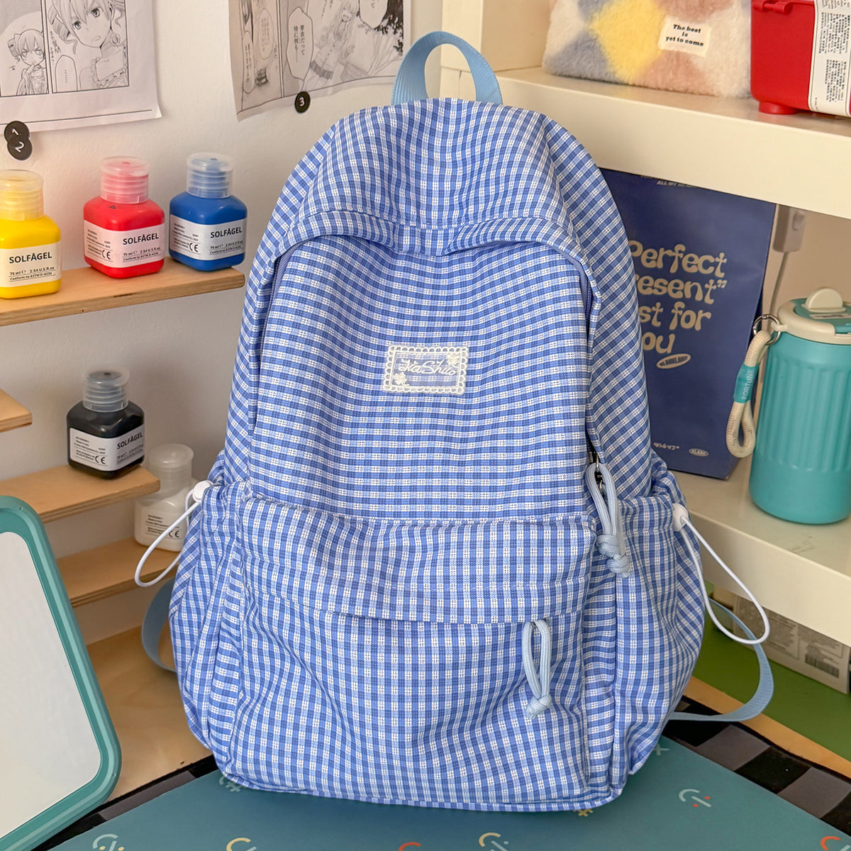 Stylischer gittergemusterter Tagesrucksack Brehn