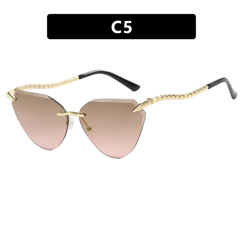 Damen Cat-Eye Sonnenbrille mit einzigartigem goldenen Rahmendesign und schützenden Gläsern Brehn