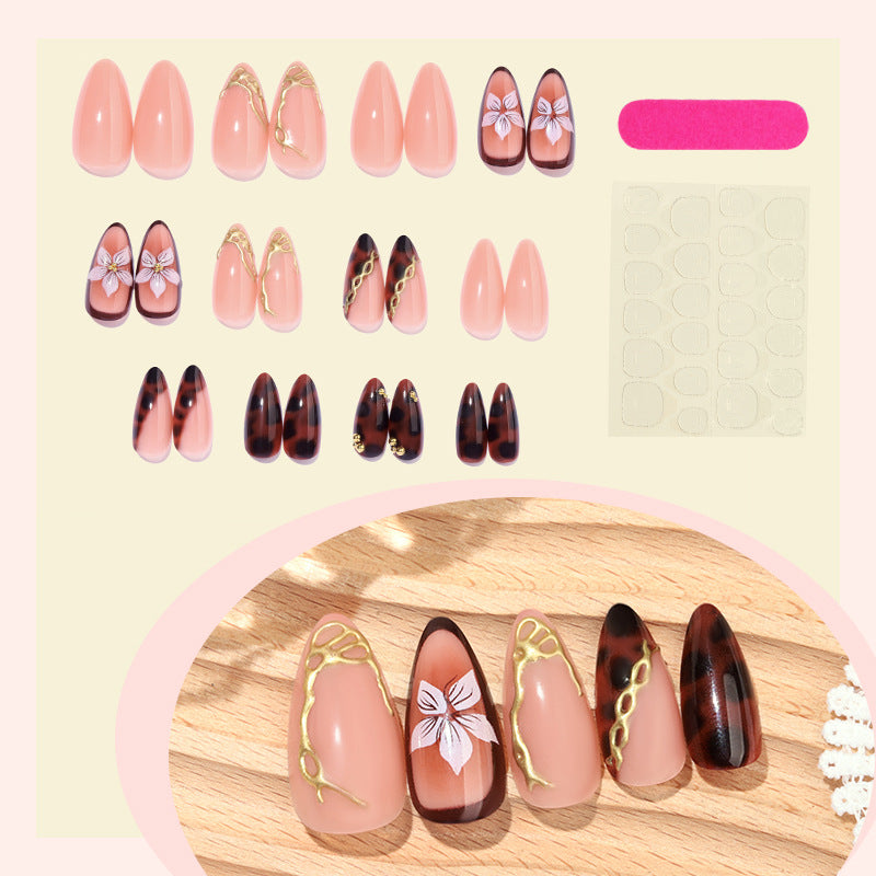 Künstlerisches Press-On-Nagelset mit eleganten Blumen- und abstrakten Designs Brehn