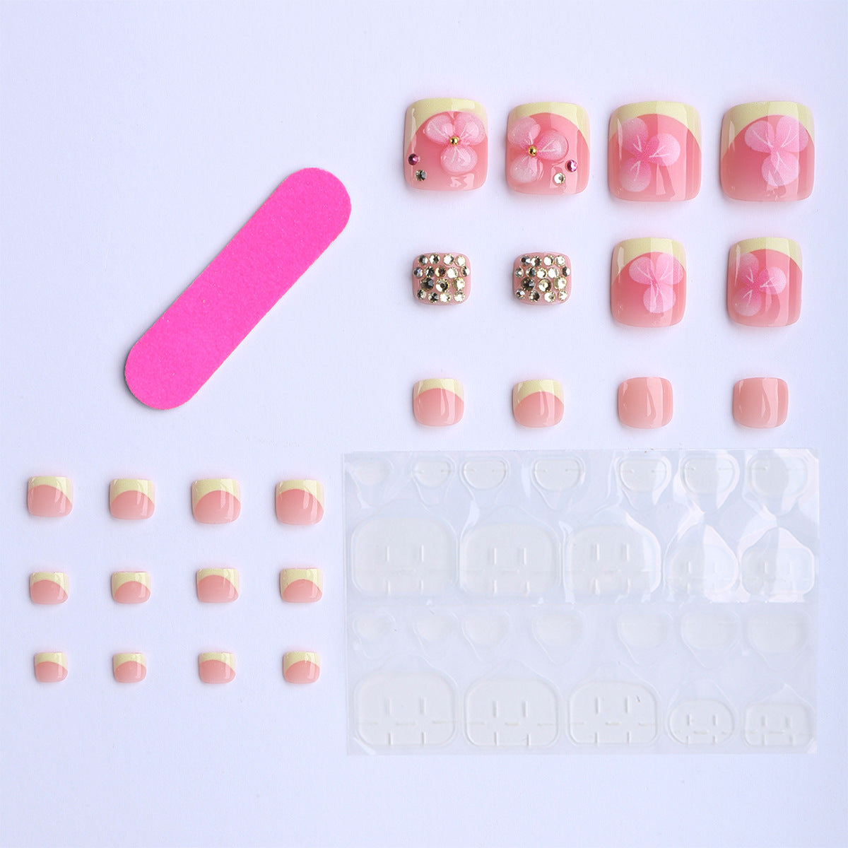 Künstliche Nagelverlängerungen mit Blüten-Design und Glitzerakzenten Brehn