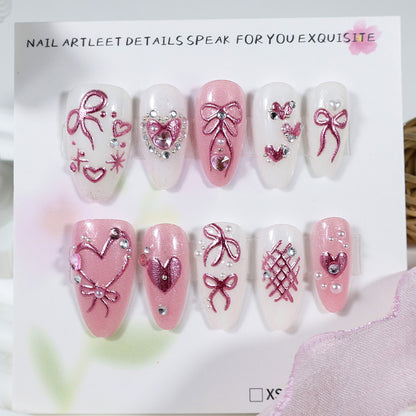 Kunstnagelset mit romantischen Schleifen- und Herzdesigns Brehn