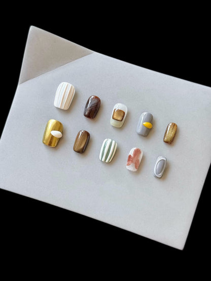 Künstlerisches Press-On-Nagelset mit einzigartigen strukturierten Designs