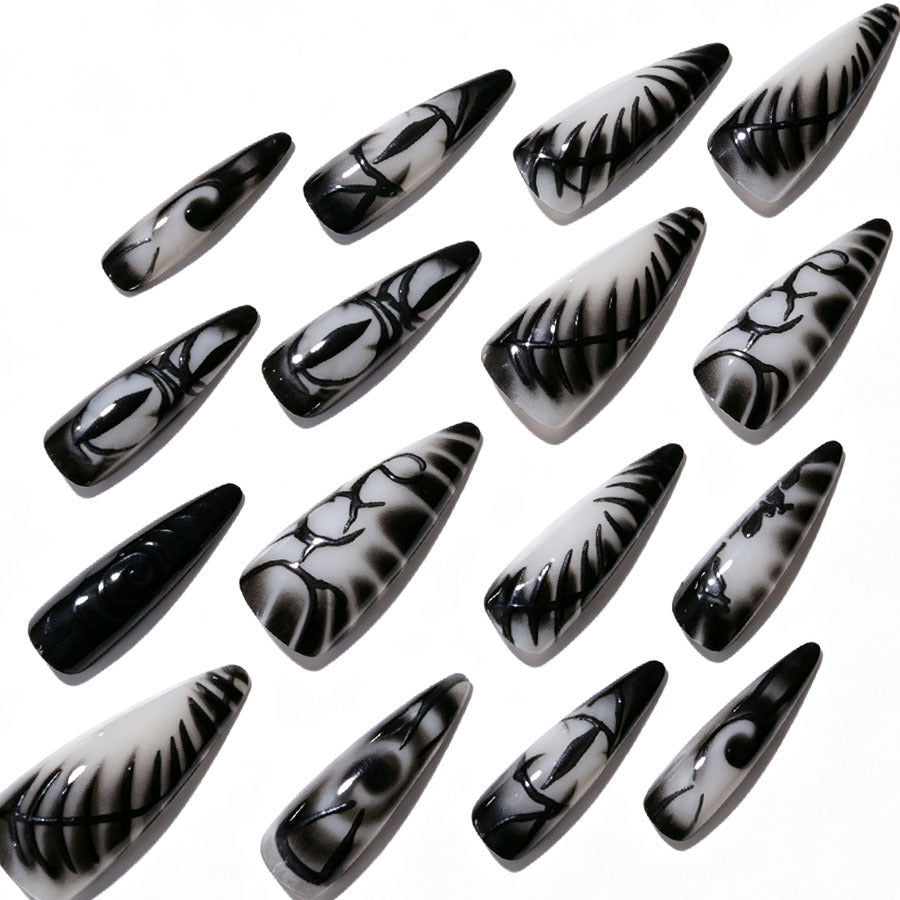 Künstlerisches Stiletto Press-On Nagelset Brehn